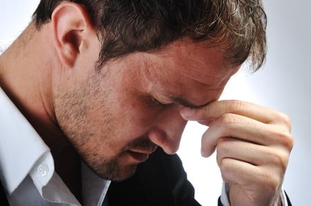 stressed man illustrating How to give advice to a friend with relationship problems